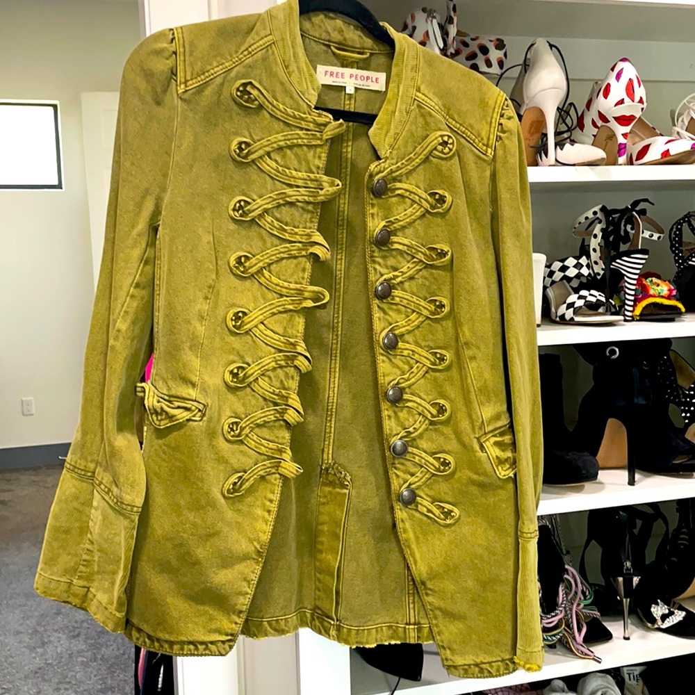 Never worn Free People jacket with unique button detail